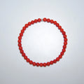 Koralle-Perlen Armband von LEÑA Kunsthandwerk, 4 mm Perlen, Elastik-Faden, Größen 13–20 cm, Made in Austria