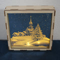 Verspiegelte Motivbox von LEÑA Kunsthandwerk mit LED-Beleuchtung, Winterlandschaft mit Häusern und Baum
