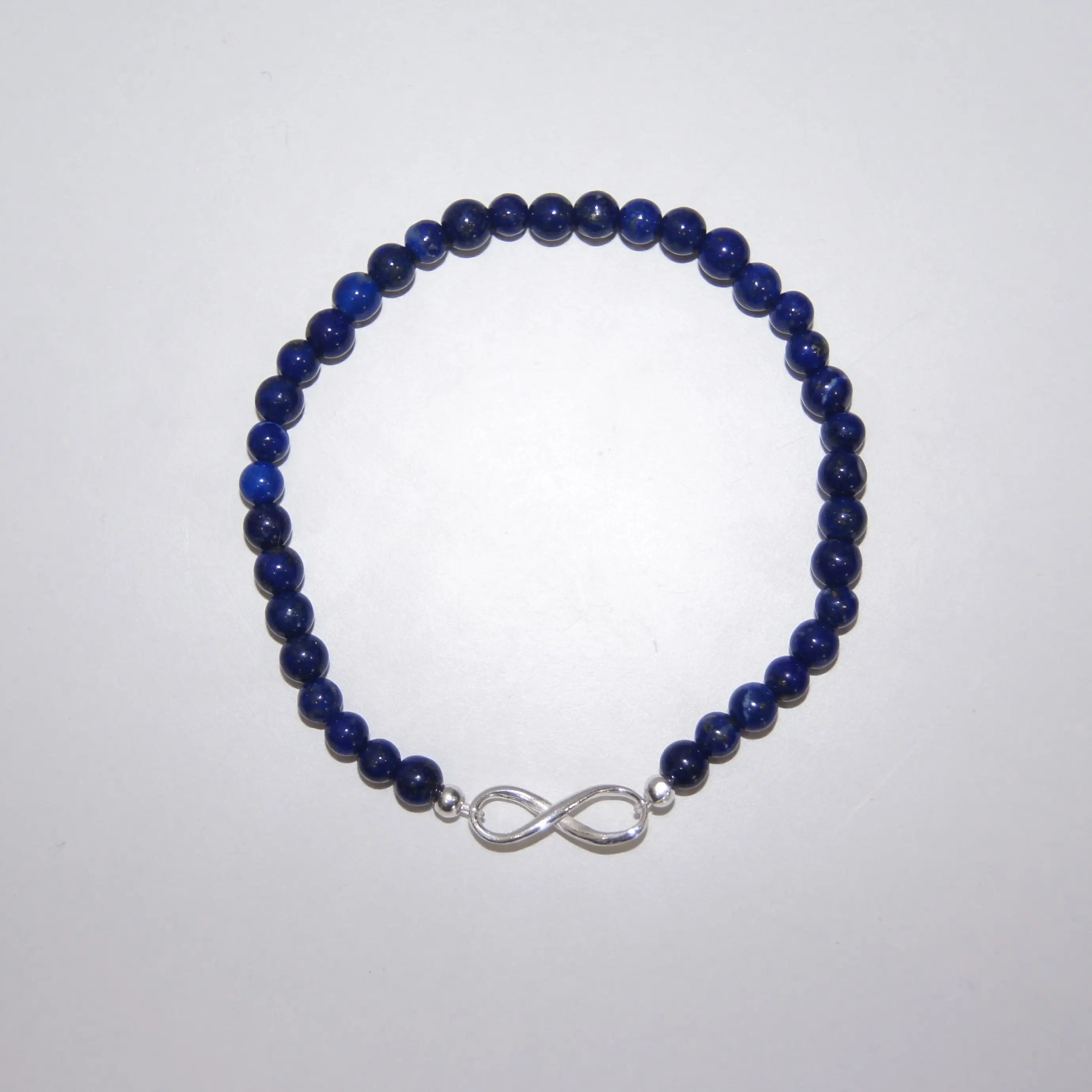 LEÑA Kunsthandwerk Lapislazuli-Armband mit 4 mm Perlen und Silber-Endlosschleife, 13–20 cm, aus Österreich