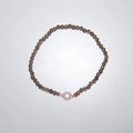 Rauchquarz-Perlenarmband von LEÑA Kunsthandwerk mit rose vergoldetem Silber Sonnen-Charm, Made in Austria