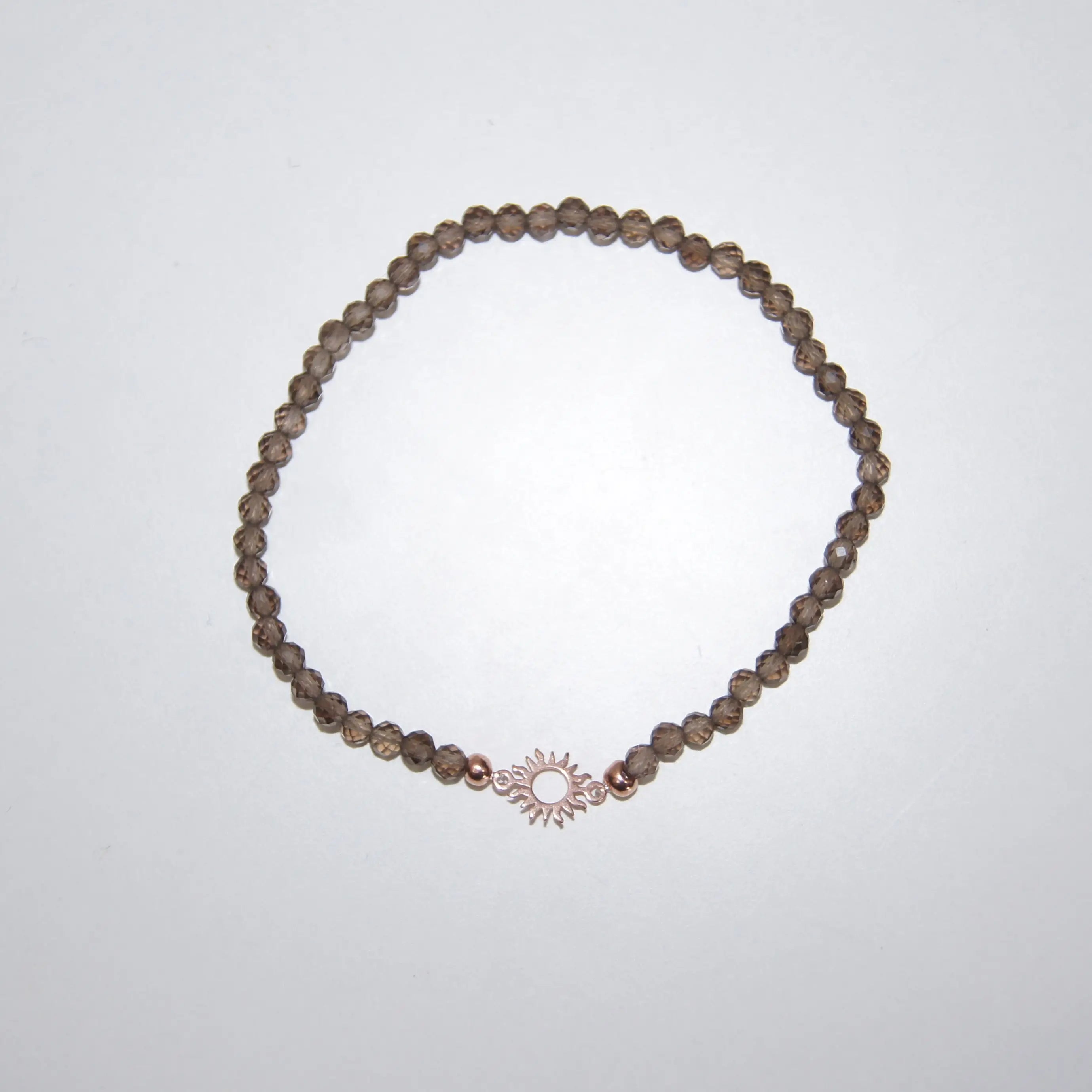 Rauchquarz-Perlenarmband von LEÑA Kunsthandwerk mit rose vergoldetem Silber Sonnen-Charm, Made in Austria